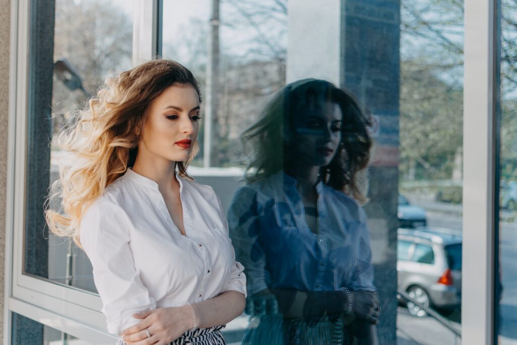 Womens Mental Health. Anxiety Panic Disorders. Bipolar Disorder. Outdoor portrait of Young sad woman